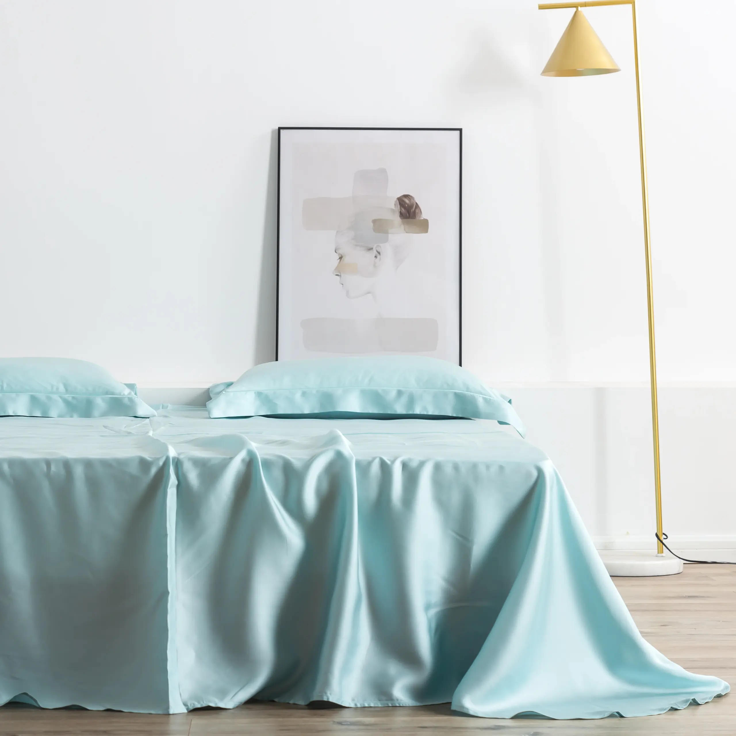 Natural indigo-dyed silk bedding showing rich blue tones and variations