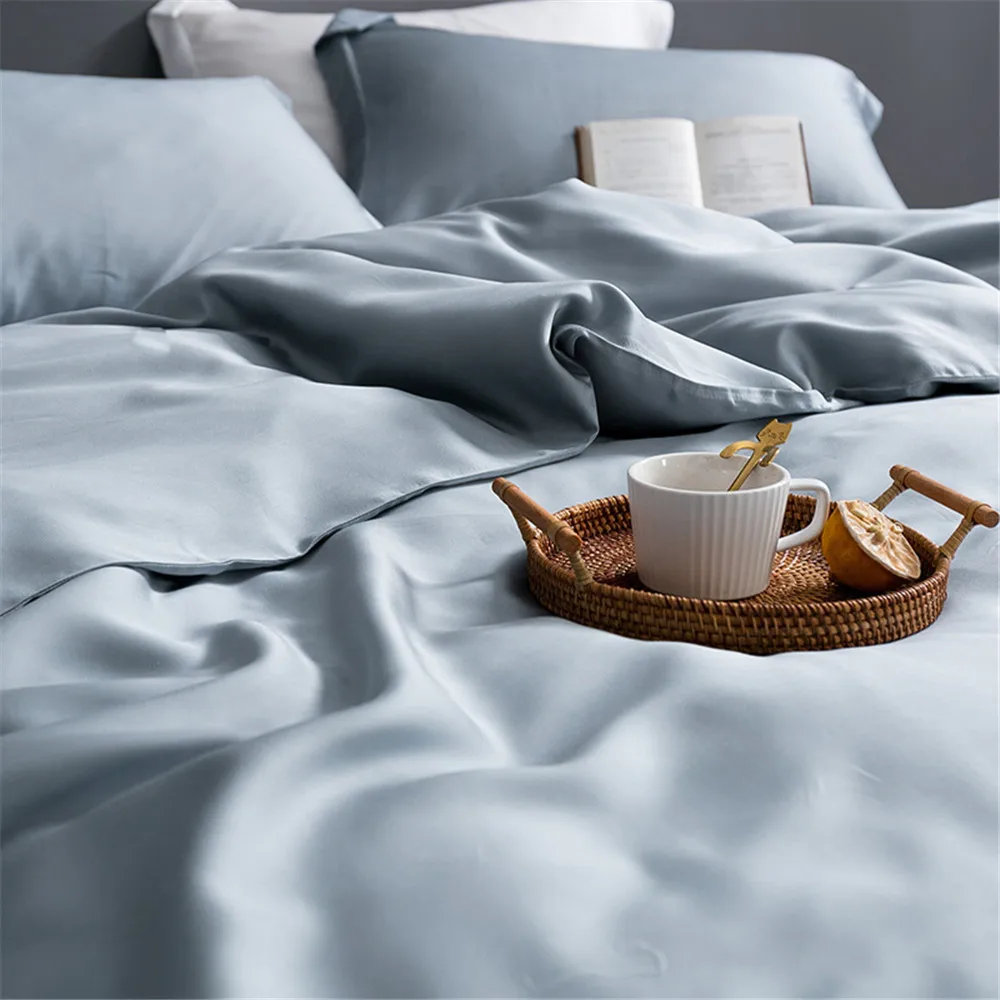 Organic silk sheet set with GOTS certification displayed for authenticity